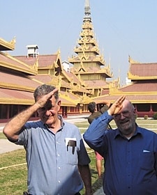 Tom Garrett (left) and Father John Behnke, CSP, stand outside of the former King's Palace in Mandalay, Myanmar (Burma).