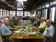 The Paulists gather for dinner at St. Mary's on the Lake, Lake George, NY: Father Jerry Kenny (first seated on left); Father Don Andrie, Father Paul Huesing, Father Tom Stransky; Father Kevin Lynch (first on right); Father John Foley; Father George Fitzgerald; and Father Bill Brimley.