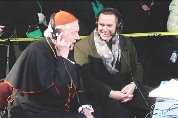 Edward Cardinal Egan and Father Dave Dwyer, CSP, broadcasting “The Busted Halo Show." 