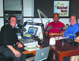 Father Steven Bell, CSP (center) with Father Dave Dwyer, CSP (left) and Mike Hayes (right) in the Busted Halo broadcast studio.