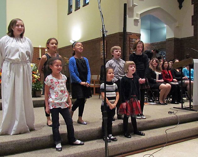 The children's choir sings during the 125th anniversary Mass at St. Lawrence Church and Newman Center in Minneapolis Nov. 3, 2012.