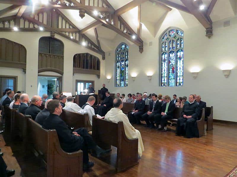 Family and friends gathered at St. Paul's College July 26 for the first promise of four men with the Paulist community.
