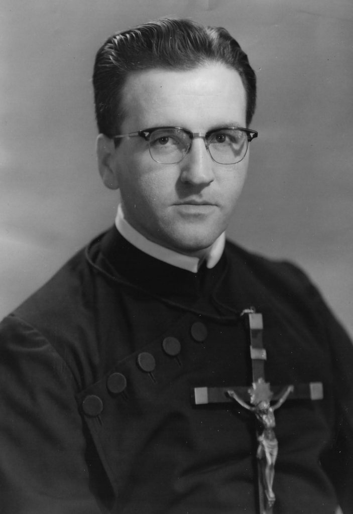 Paulist Fr. Joseph Mahon wearing the Paulist habit and mission cross in May, 1959.