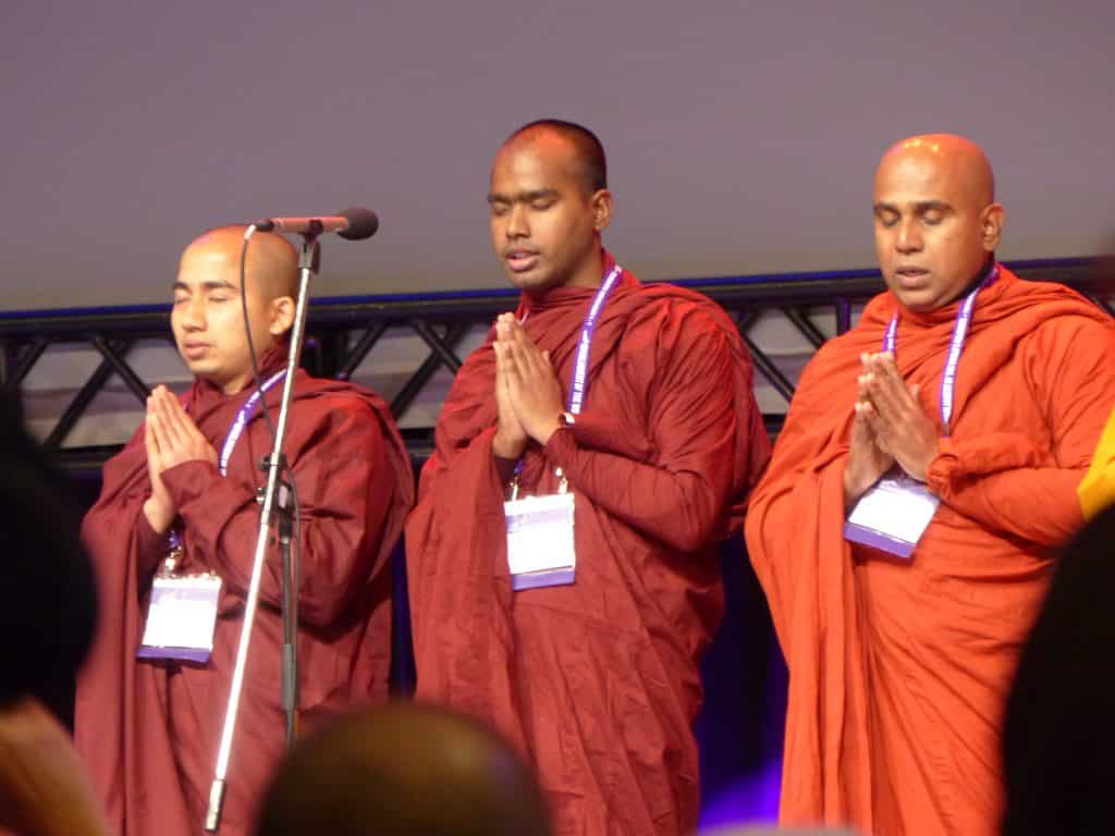 Buddhist monks offering a prayer 