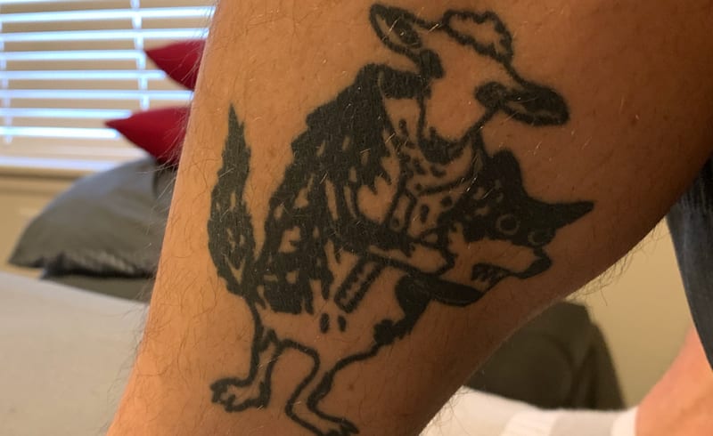 Paulist novice Sam Matthiesen's tattoo of a sheep and a wolf.